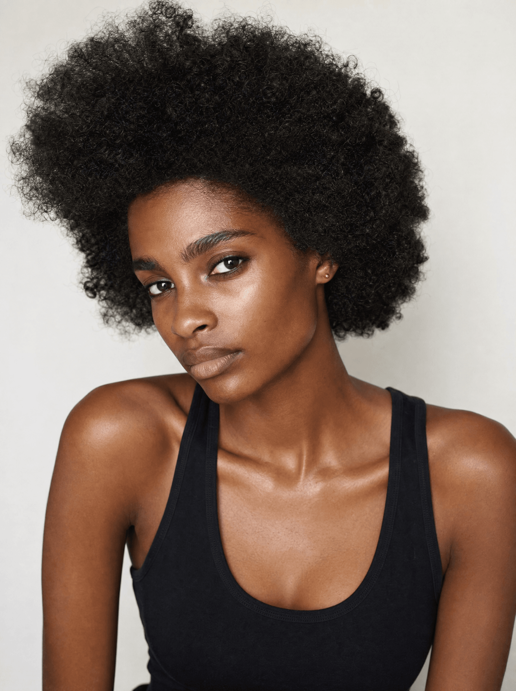 West African woman with afro